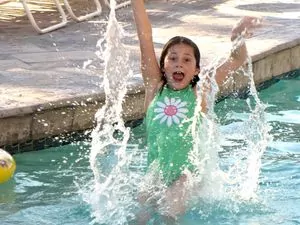 Opto-Mization optometry clinic interior showcasing vision therapy equipment and patient consultations.