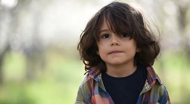 Opto-Mization optometry clinic interior showcasing vision therapy equipment and patient consultations.