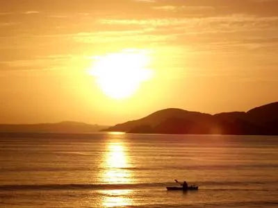 Opto-Mization optometry clinic interior showcasing vision therapy equipment and patient consultations.