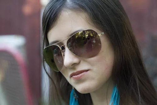 Opto-Mization optometry clinic interior showcasing vision therapy equipment and patient consultations.