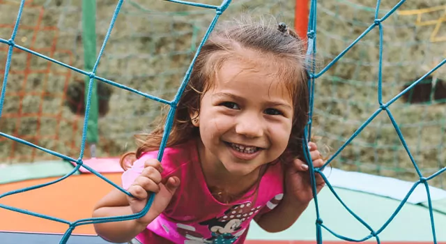 Opto-Mization optometry clinic interior showcasing vision therapy equipment and patient consultations.